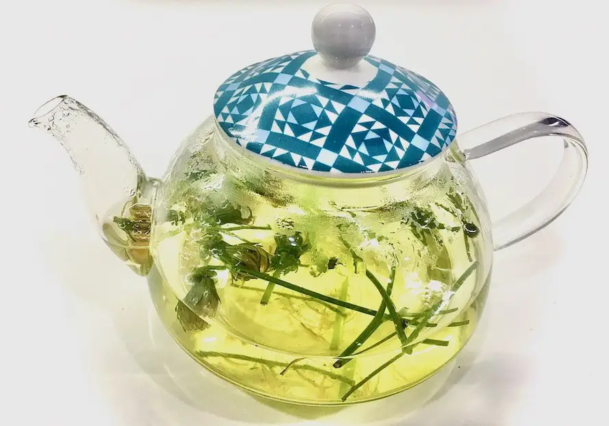 dandelion tea steeping in a pot